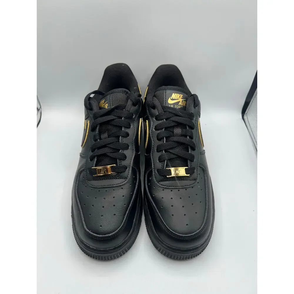 Nike Air Force 1 Low ‘07 Essential “Black Gold Swoosh” size 7.5 women’s used